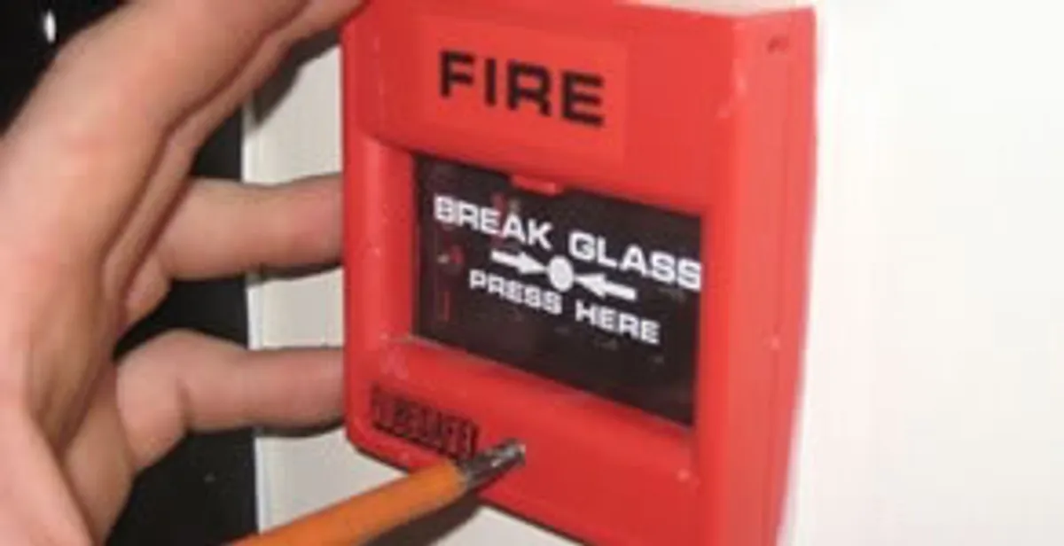 fire alarm installation service showing manual fire alarm pull station installed by licensed electricians in Salt Lake City, UT