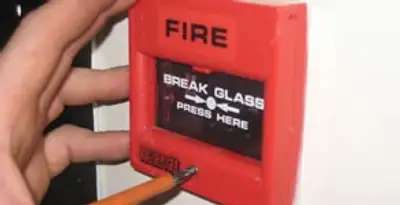 fire alarm installation service showing manual fire alarm pull station installed by licensed electricians in Salt Lake City, UT