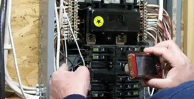 Home electrical inspection of circuit breaker panel by licensed electrician in Salt Lake City, UT