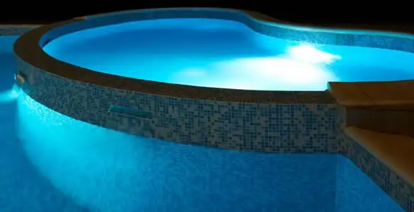 pool light installation and repair services highlighting illuminated pool interior lighting in Salt Lake City, UT