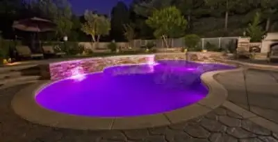 pool light installation and repair services illuminating a residential swimming pool in Salt Lake City, UT
