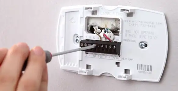 Thermostat installation service with proper wiring and secure wall mounting in Salt Lake City, UT